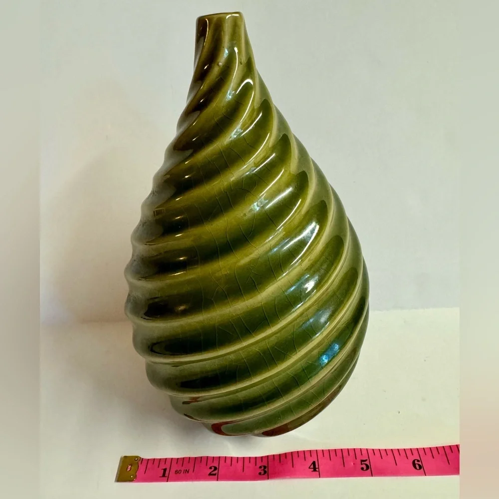 Vintage MCM pottery in earthy sage green  swirl vase.Has crazing.